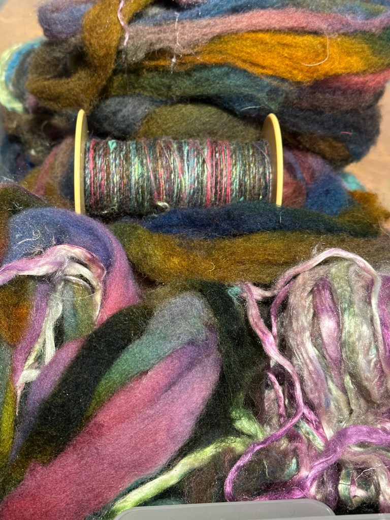 a spool of spun singles and the groups of fibers used